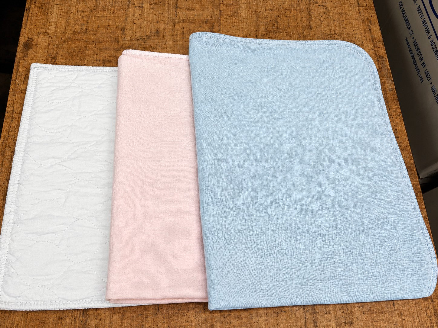 Reclaimed Absorbent Pads — Wholesale Industrial Wiping & Spill Pads- (Approx. 50 pieces per 50 pound box) - Quick Rag Supply